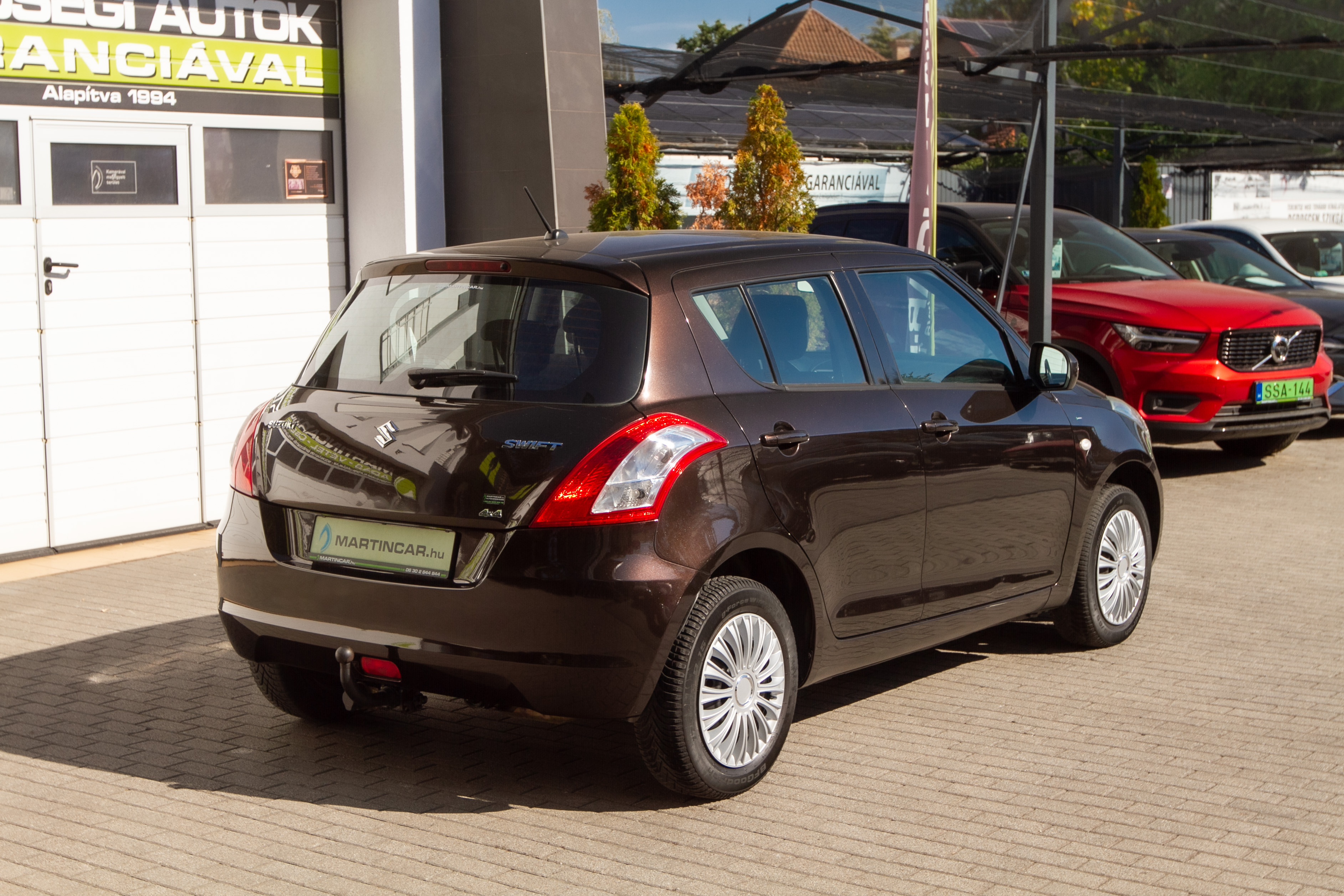 Suzuki Swift 4WD 1,2 69 kW manualna rok 2015, brązowy, 100 000 km, Węgry — zdjęcie 4 z 60
